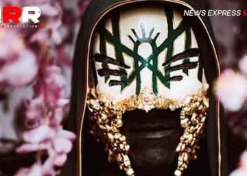 Vessel de Sleep Token masqué parmi des fleurs pour Take Me Back To Eden